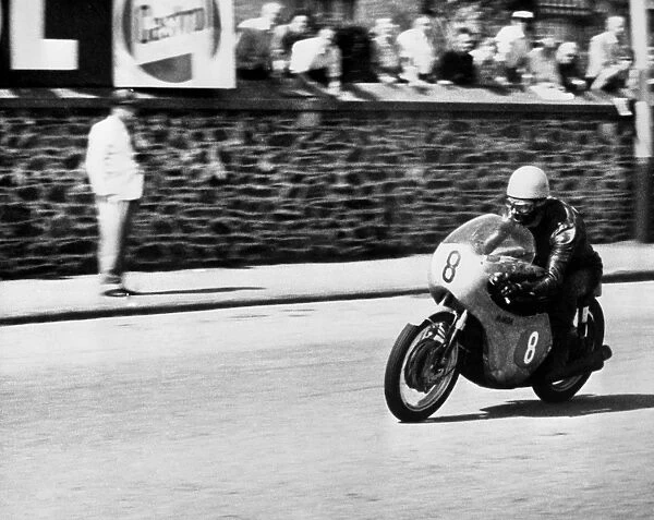 Isle of Man: Jim Redman pictured at speed on his new four-cylinder Honda during the