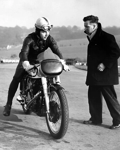 John Surtees practising at Brands Hatch on his Norton motorbike. He is trying to