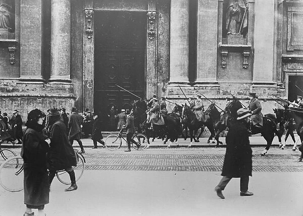 Keeping order in Munich : crowds dispersed by cavalry. The German Imperial Defence Corp