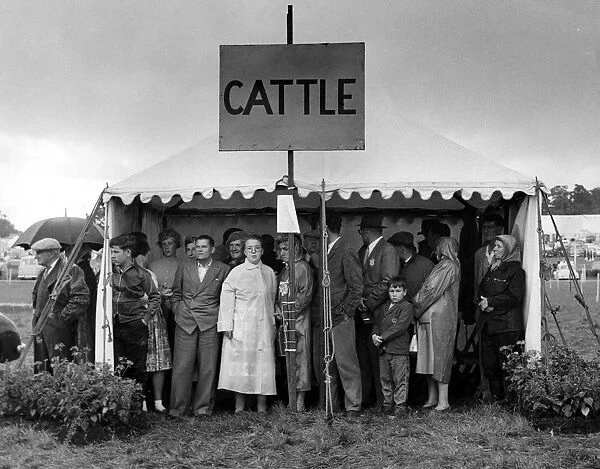 Kent. Edenbridge Agricultural Show. August 1960 Visitors sheltering from the rain