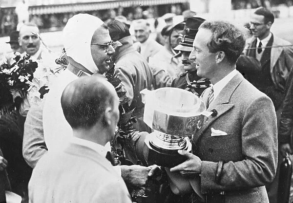 King Leopold of Belgians presented the Cup to the winner, R. Hasse (German Auto Union)