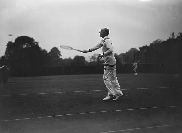 Lady Crosfields lawn tennis tournament at Highgate. Sir Samuel Hoare, the Air Minister