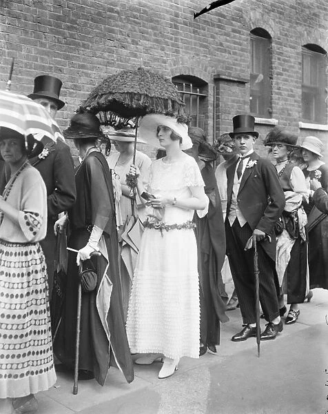 Lady Mary Thynne waiting in the queue at the Eton and Harrow cricket match. 13