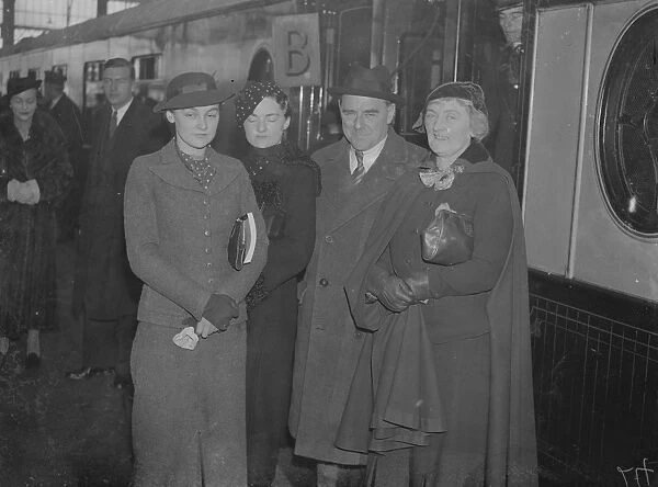 Laewis Casson seen off by wife and daughter when he leaves for America. Lewis Casson