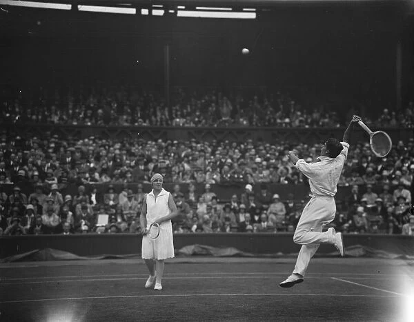 Lawn tennis at Wimbledon. H Austin and Betty Nuthall in play. 27 June 1929