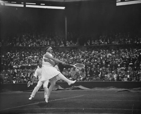 Lawn tennis at Wimbledon. Miss Betty Nuthall in play. 27 June 1929