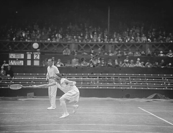 Lawn tennis at Wimbledon. Mr and Mrs L A Godfree in play. 5 July 1927