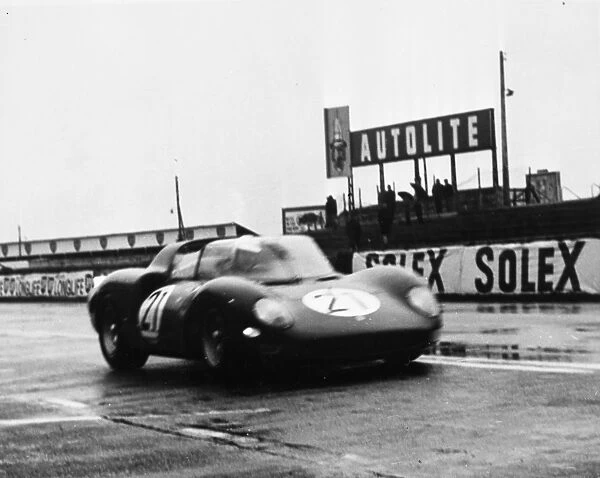 Le Mans France The Ferrari No 21 driven by World Chapion for 1964 John Surtees is