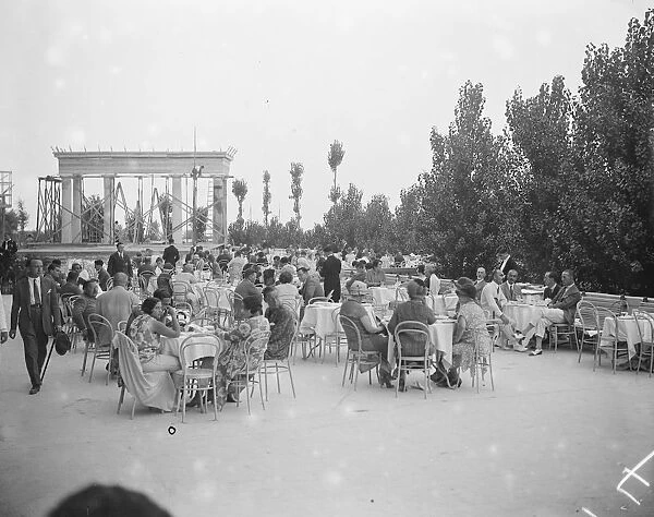 On the Lido Guests taking tea on the terrace of the Excelsior Palace Hotel 25 August