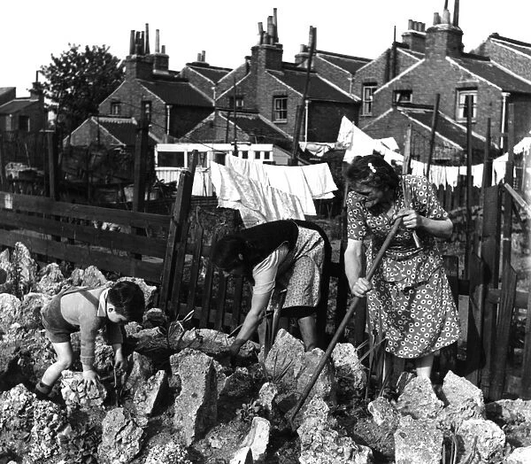 London. Bermondsey brightens up her bomb sites. 1950. Alma Grove, Bermondsey. Women