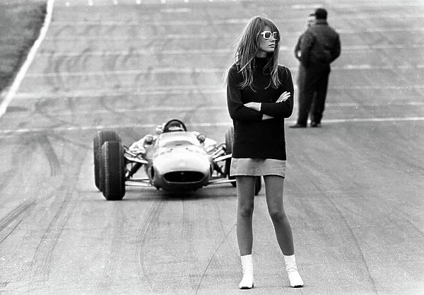 Look out, beautiful. Brands Hatch, England; Nonchalent hazard for racing drivers