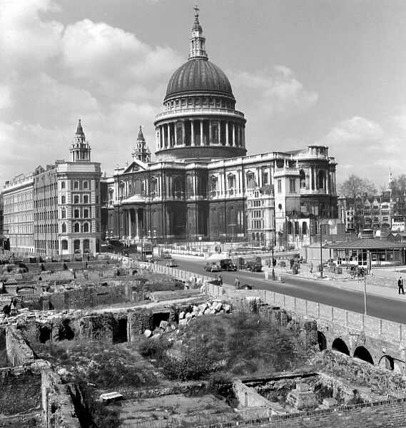 Looking at St Pauls Cathedral, down Cannon Street, still showing wartime bomb damage