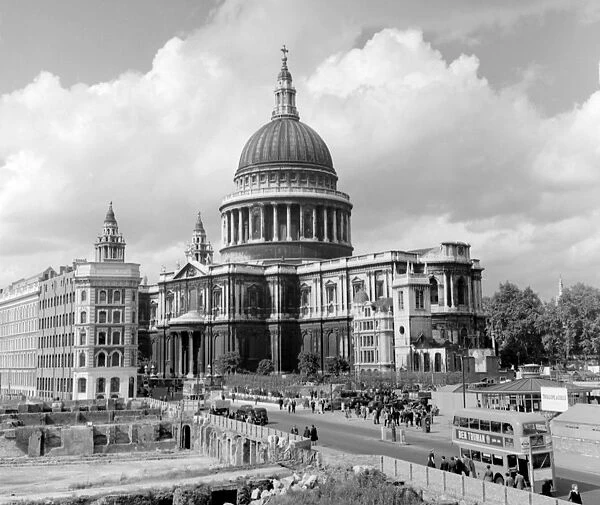 Looking at St Pauls Cathedral, down Cannon Street, with a derelict bomb - site nearby
