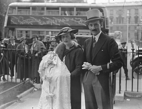 Lord and Lady Grenfell and their infant son after the babys christening at St