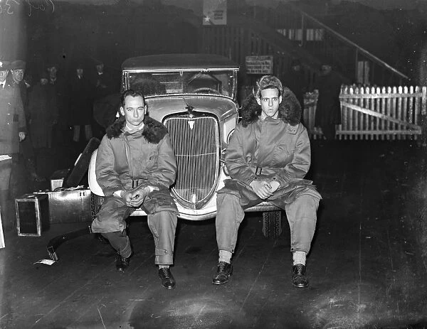 Lt Joels Thorne, driver and Mr Jogn V Oliveau ( left ) mechanic with car to enter