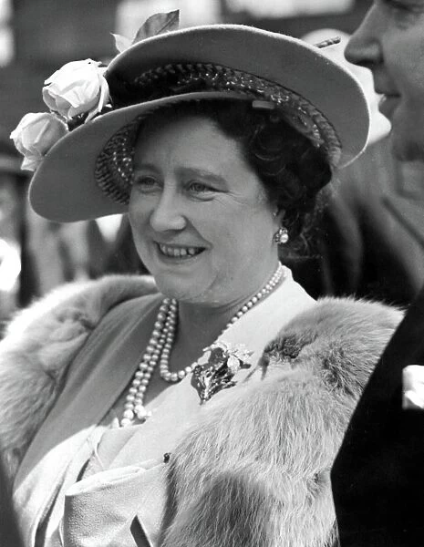 Her Majesty, Queen Elizabeth, The Queen Mother wearing a spring hat with peak. Festival of Britain