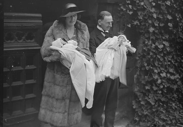 Major and Mrs Gordon home with their twin son and daughter after the christening