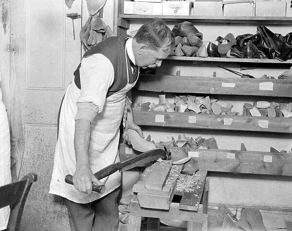 Making of wooden shoe lasts ( W. H. Smith, Sloane Street ). Knifing and shaping