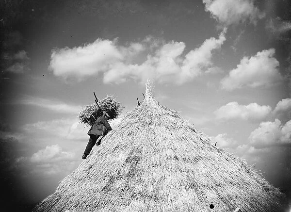 Man making a haystack. 1935