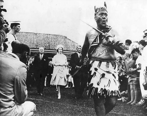 A Maori chief performing a dance of welcome before Queen Elizabeth II during celebrations