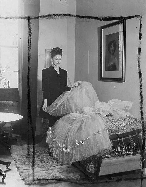 Margot Fonteyn at home. Margot Fonteyn, displays classic ballet dresses in her drawing room