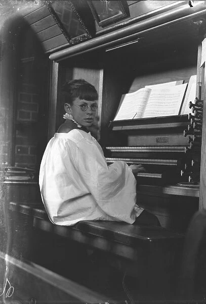 Master Ivor Keys at the organ of St Marys Parish church, Littlehampton, Sussex