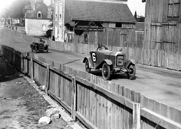 A Mathis car in 1923, a six-cylinder model, driving along a track