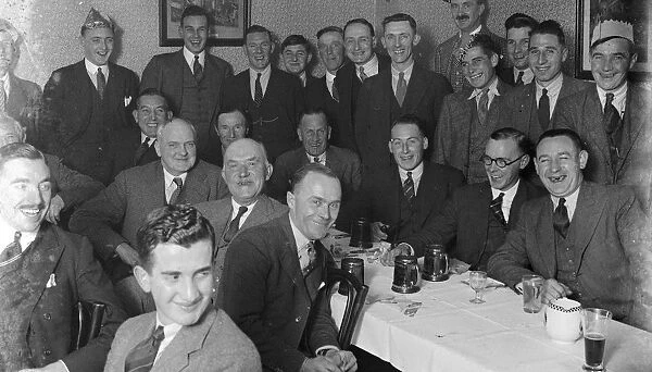 Men enjoying a dinner at the Rat and Sparrow Club, Chelsfield. 1935