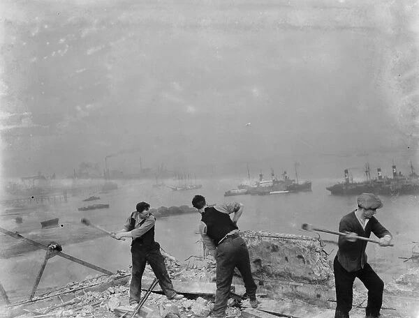 Men working on the redevelopment of the Erith riverside in London. 1937