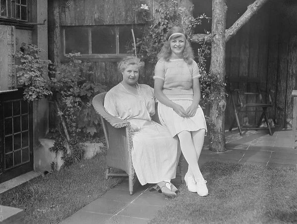 Miss Betty Nuthall, the junior lawn tennis champion, with her mother. 29 September