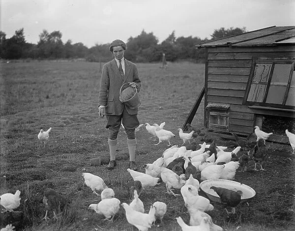 Miss Foster winner of Kings prize at Bisley at home of her chicken farm. 21 July 1930