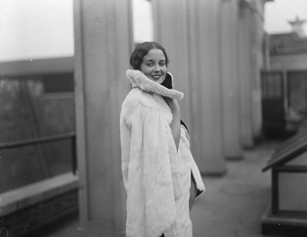 Miss Peggy Lamont, Englands most beautiful girl, in latest ermine cape cloak