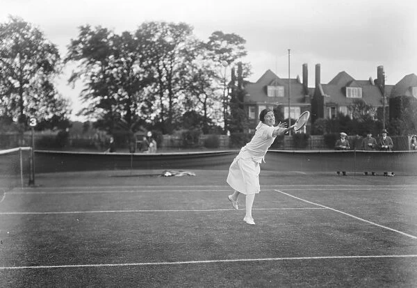Miss Ryan, the famous tennis player, in play at Chiswick. 30 May 1925