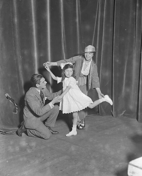 Miss Teddie Gerrard and Mr Harry Pilcer teaching Gwennie Seabrook to dance dance