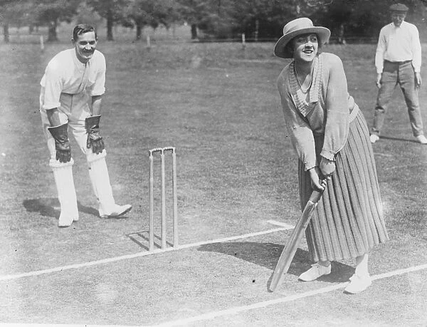 Miss Violet Loraine, President of the Langley Park ( Berks ) Cricket Club plays herself in