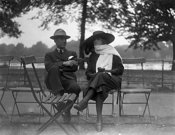 Mme Peletier with her husband sitting in Hyde Park, London. She is an English