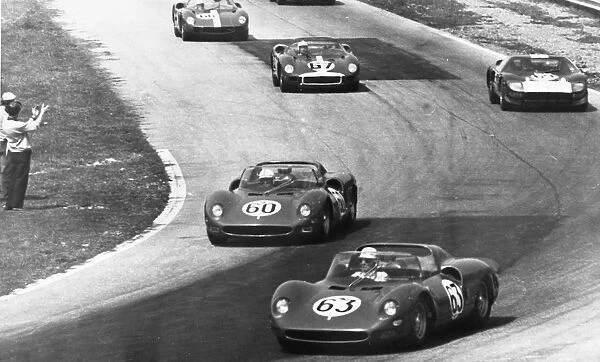 Monza Italy Pictured sweeping round a bend in the 1000 km International Motor Race