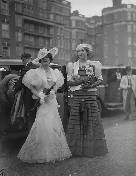 Mother and sister of harrow Captain arrive at Lord s. Rain threatened fashions when the Eton