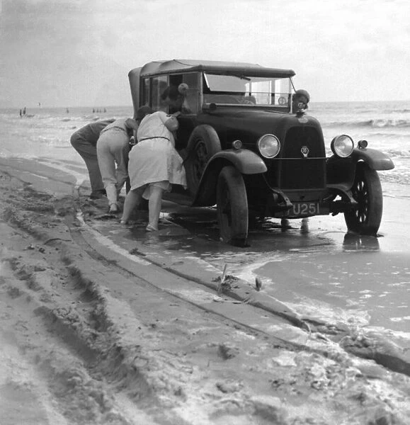 Motor cars stuck at Camber Sands, Sussex. 1933