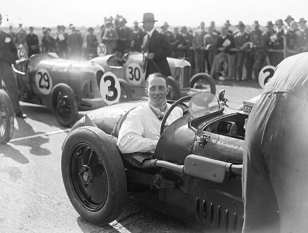 Motoring thrills at Brookland. The Earl of Cottenham, one of the competitors