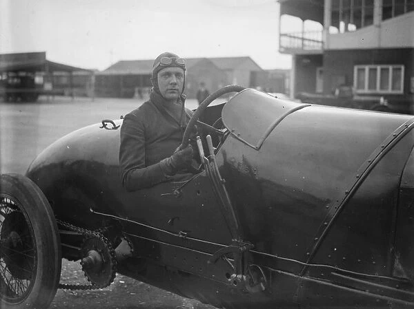 Mr C J Cobbat the wheel of Mr Wards fiat ) competing in gold cup ). 3 April 1926