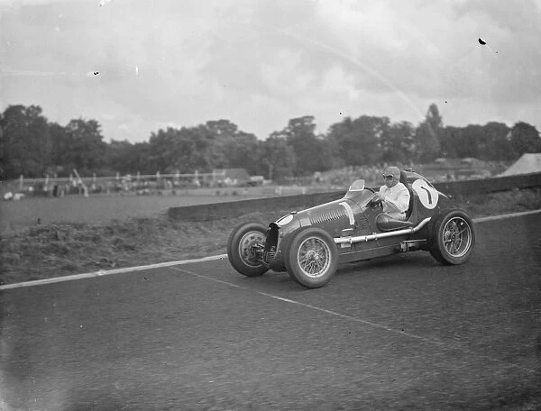 Mr H L Hadley and his Austin winning the Imperial Trophy at Crystal Palace Racing, London