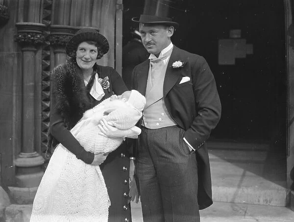 Mr and Mrs FA Gardiner and their infant son after the babys christening at St Marks Church