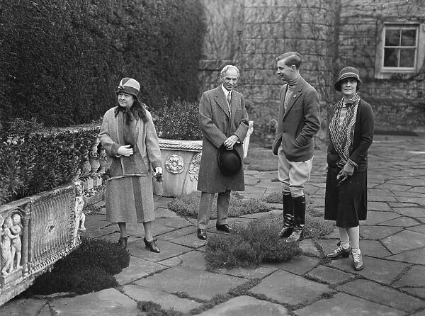 Mr and Mrs Henry Ford with Lady Astor and the Honourable H W Astor on the terrace at Cliveden