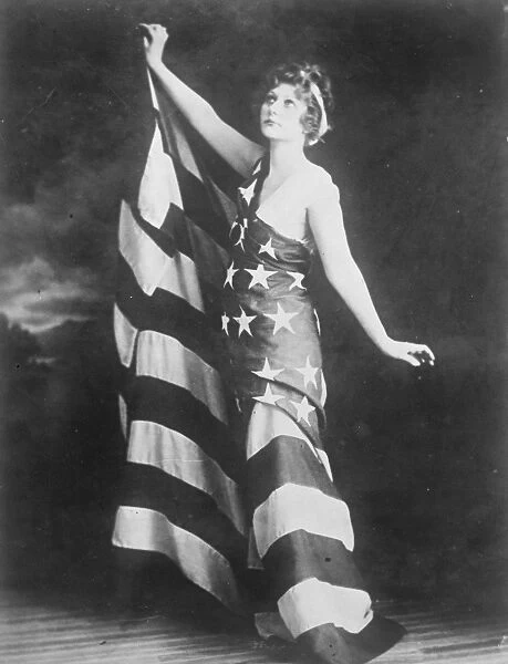 Mrs Helen Woodruff draped in the American flag. 1924