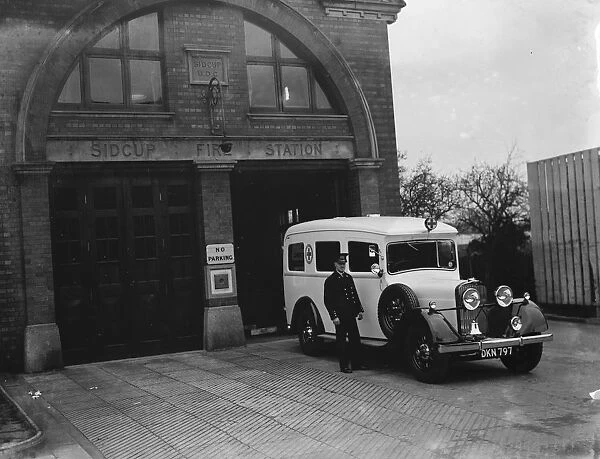 A new ambulance outside the fire station in Sidcup, Kent. 1936