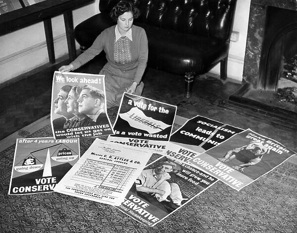 New conservative election posters laid out for inspection at Conservative central