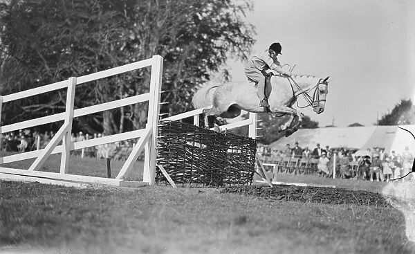 New Forest show at Totton Hon Pamela Digby in the childrens jumping class 1933