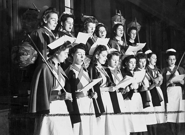 Nurses of Londons Westminster Hospital rehearsing the carols they will sing at Christmas