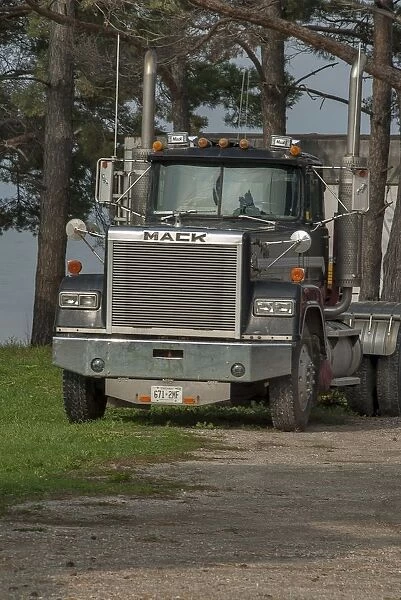Old MACK 4x4 semi (articulated) tractor unit parked up on Manitoulin Island Ontario